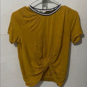 A mustard color tank top